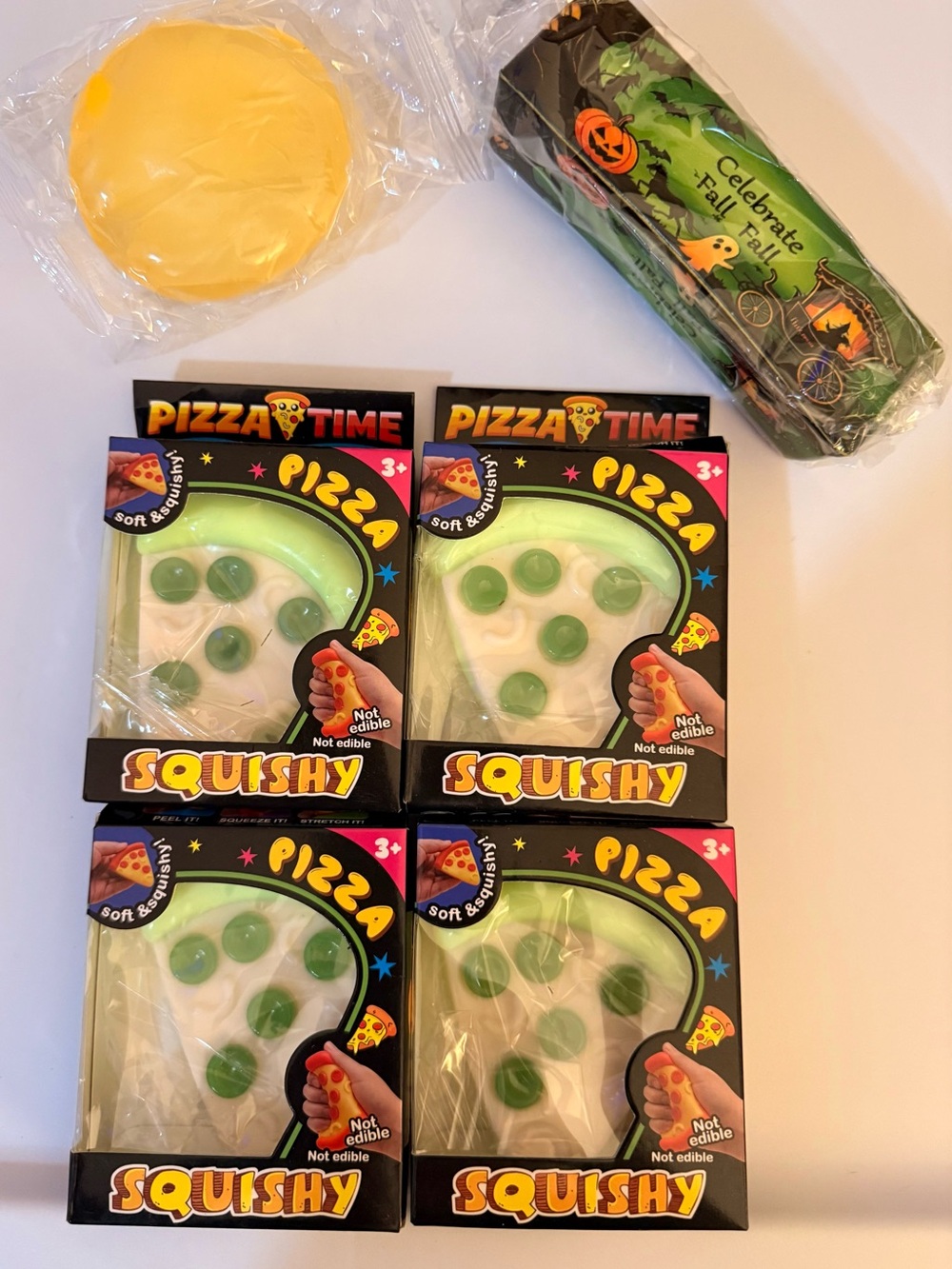 Squishy Toy - Green & White Slice (4 Pack), 1 Halloween butter and 1 coconut oi